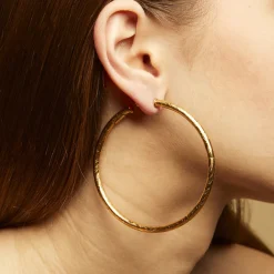 Boucles d'oreilles créoles Maori grand modèle dorées